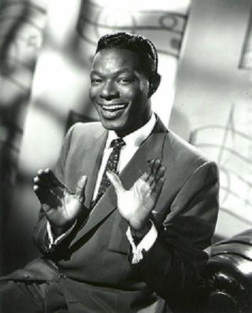 The phrase "Blacks Shaping America"  refers to Nat King Cole.  Pop music was his love and making people happy was what he did with his music.